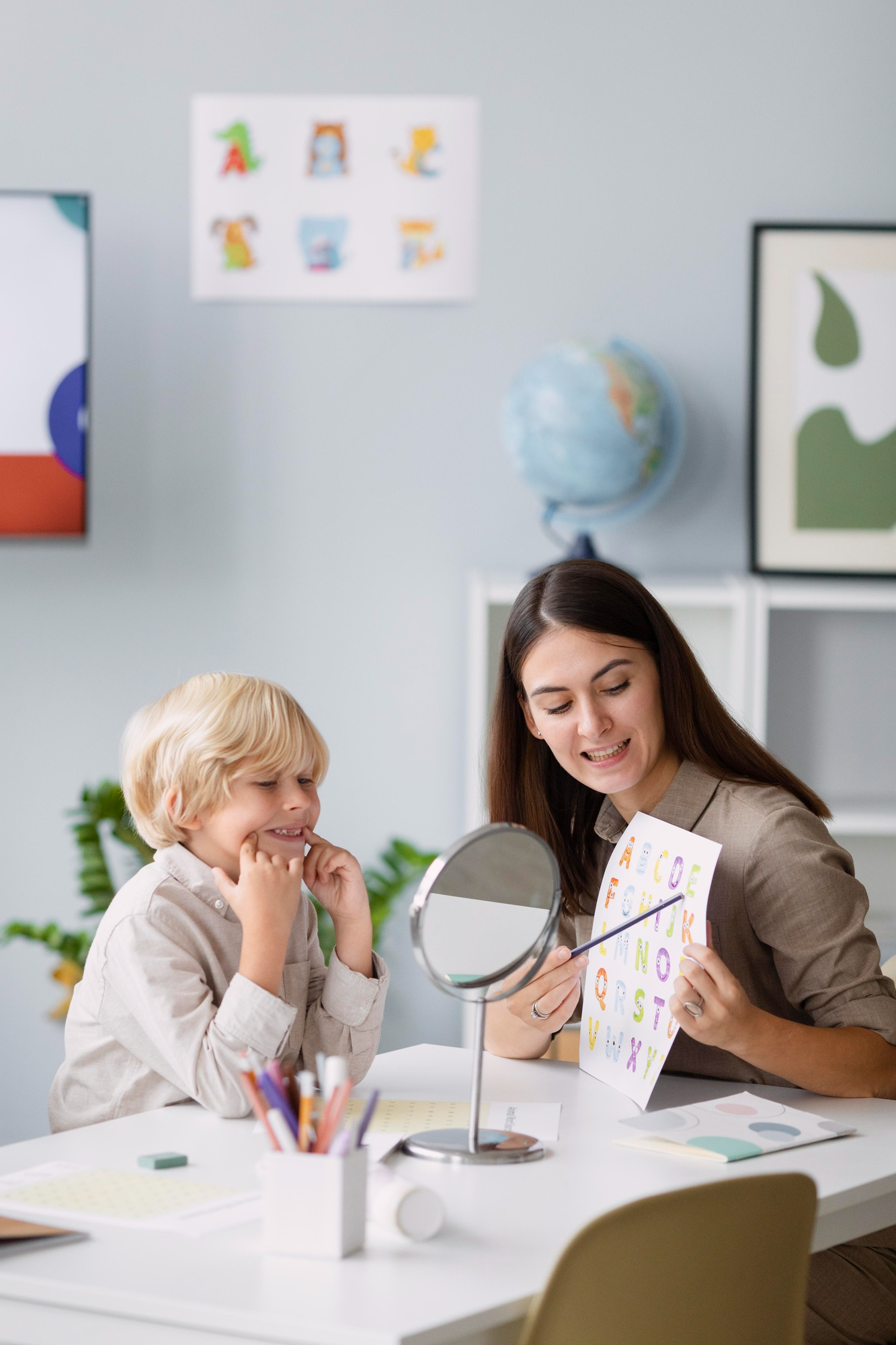 Therapist guiding a child through speech exercises